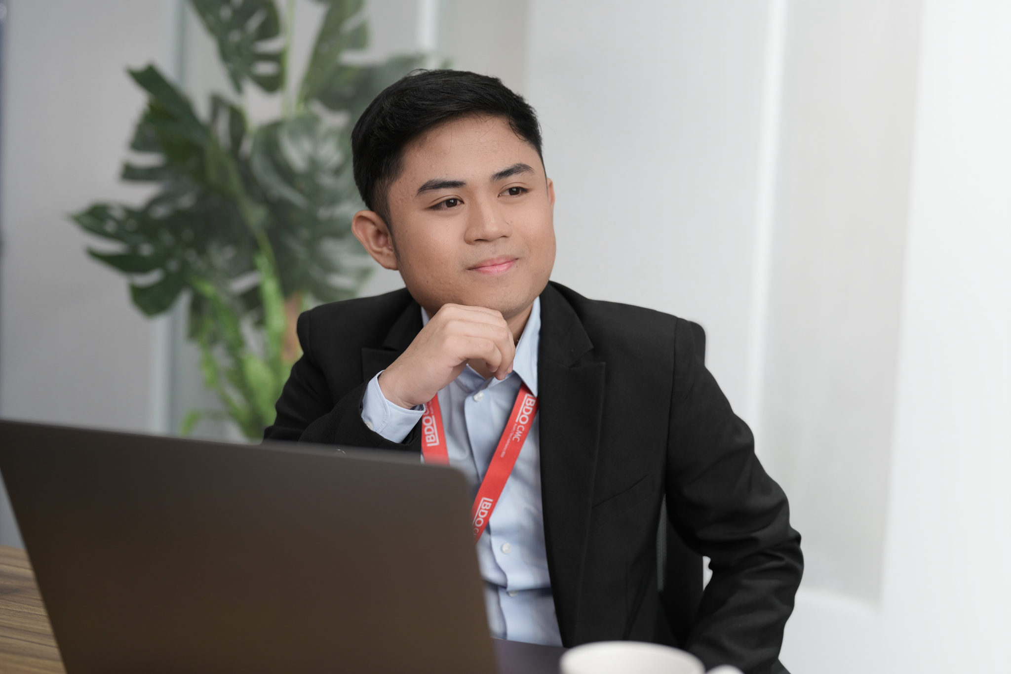 BDO CMC professional working in the office